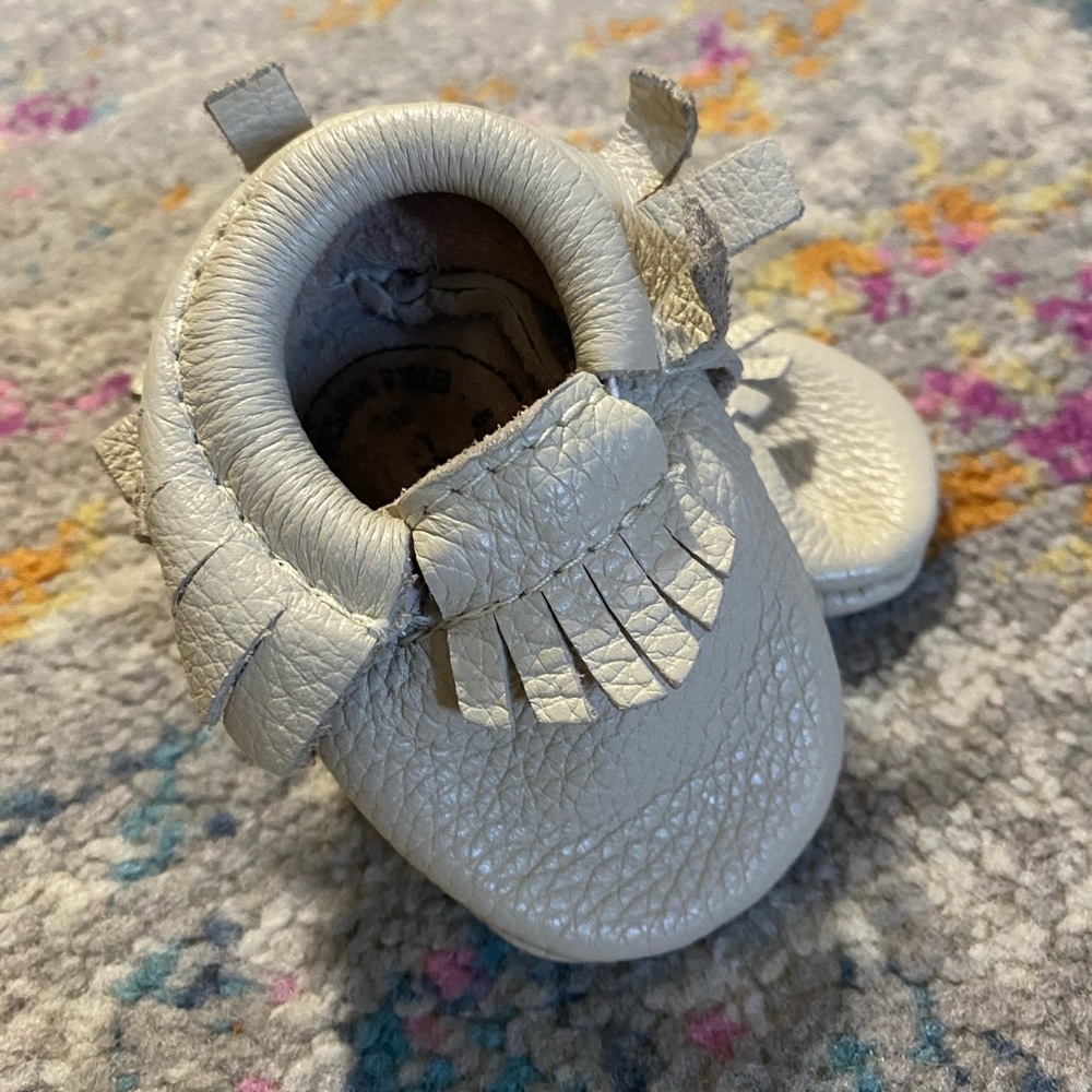 Cream freshly picked moccasins